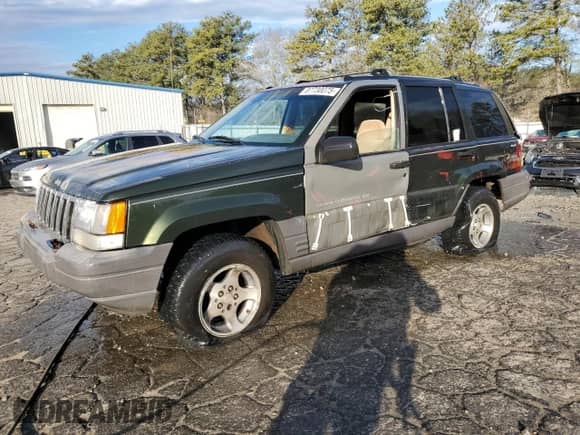 1996 Jeep Grand Cherokee с VIN 1J4EZ58S9TC148692, выставлен на аукционе Copart как лот 87730075 с пробегом Не указан миль и Списание • Salvage title. История ставок и продаж доступна на DreamBid. Изображение 1.