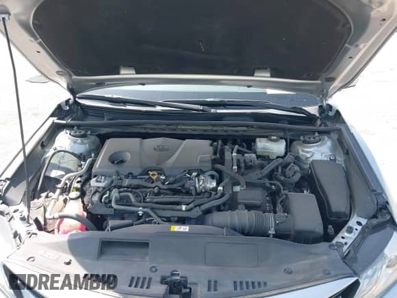 2021 Toyota Camry Hybrid XLE with VIN 4T1F31AK5MU565376, listed as a IAAI auction lot 42687616 with 57,880 mi miles and . Bid and sale history available at DreamBid. Image 10.