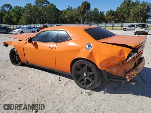 2014 Dodge Challenger R/T Plus with VIN 2C3CDYBT0EH158207, listed as a Copart auction lot 49738195 with 144,605 mi miles and Salvage title. Bid and sale history available at DreamBid. Image 2.