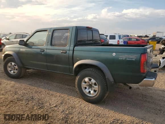 2000 Nissan Frontier XE with VIN 1N6ED27Y9YC425953, listed as a Copart auction lot 68830265 with 317,976 mi miles and Clean title. Bid and sale history available at DreamBid. Image 2.