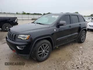 2017 Jeep Grand Cherokee Trailhawk with VIN 1C4RJFLG1HC624285, listed as a Copart auction lot 68450035 with 145,820 mi miles and Salvage title. Bid and sale history available at DreamBid. Image 1.