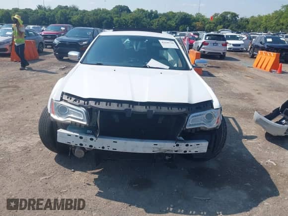 2013 Chrysler 300 C with VIN 2C3CCAET3DH691060, listed as a IAAI auction lot 42940720 with 97,395 mi miles and . Bid and sale history available at DreamBid. Image 12.