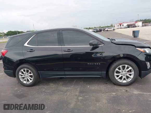 2019 Chevrolet Equinox LT z VIN 3GNAXKEV4KL223820, wystawiony jako IAAI lot #43423889 z przebiegiem 60 241 mil mil oraz . Historia ofert i sprzedaży dostępna na DreamBid. Obrazek 13.