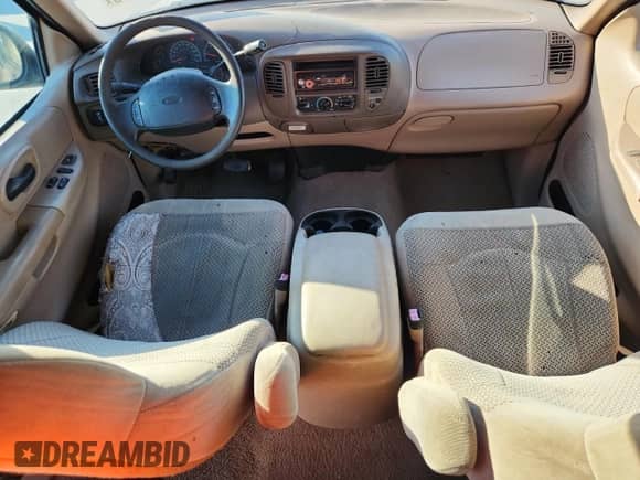 1999 Ford F-150 с VIN 1FTRX17W4XNB72337, выставлен на аукционе Copart как лот 86766575 с пробегом 183 712 миль миль и Чистый • Clean title. История ставок и продаж доступна на DreamBid. Изображение 8.