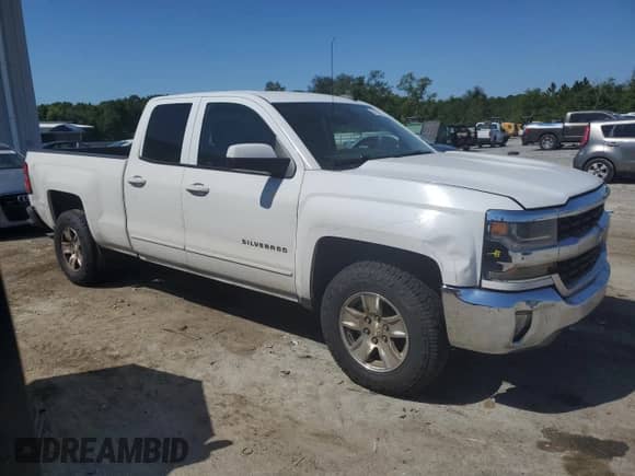 2016 Chevrolet Silverado 1500 LT with VIN 1GCRCREH7GZ276568, listed as a Copart auction lot 52934555 with 264,378 mi miles and Salvage title. Bid and sale history available at DreamBid. Image 4.