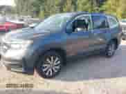 2022 Honda Pilot EX-L with VIN 5FNYF6H54NB099516, listed as a IAAI auction lot 43334754 with 44,731 mi miles and . Bid and sale history available at DreamBid. Image 20.