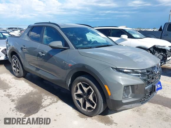 2024 Hyundai Santa Cruz Limited with VIN 5NTJEDDF6RH122391, listed as a IAAI auction lot 42391289 with 14,876 mi miles and . Bid and sale history available at DreamBid. Image 1.