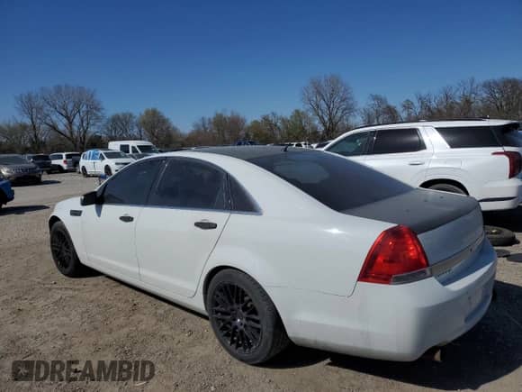 2013 Chevrolet Caprice Police Police with VIN 6G1MK5U26DL829238, listed as a Copart auction lot 52391755 with 111,826 mi miles and Salvage title. Bid and sale history available at DreamBid. Image 2.
