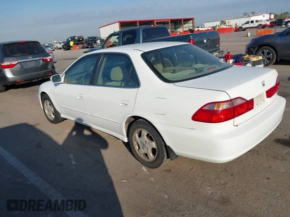 1999 Honda Accord EX with VIN JHMCG5654XC033129, listed as a IAAI auction lot 43465422 with 240,823 mi miles and . Bid and sale history available at DreamBid. Image 3.