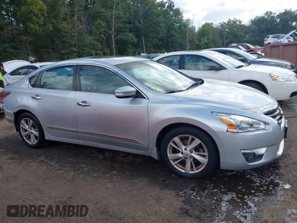 2015 Nissan Altima S z VIN 1N4AL3AP1FC186086, wystawiony jako IAAI lot #43347933 z przebiegiem 143 688 mil mil oraz . Historia ofert i sprzedaży dostępna na DreamBid. Obrazek 13.