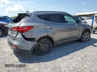 2014 Hyundai Santa Fe z VIN 5XYZUDLA8EG153833, wystawiony jako Copart lot #80484735 z przebiegiem 149 606 mil mil oraz Czysty tytuł • Clean title. Historia ofert i sprzedaży dostępna na DreamBid. Obrazek 3.