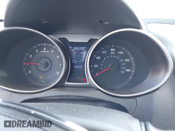 2012 Hyundai Veloster w/Black Int z VIN KMHTC6AD0CU023702, wystawiony jako IAAI lot #43149525 z przebiegiem 166 308 mil mil oraz . Historia ofert i sprzedaży dostępna na DreamBid. Obrazek 7.