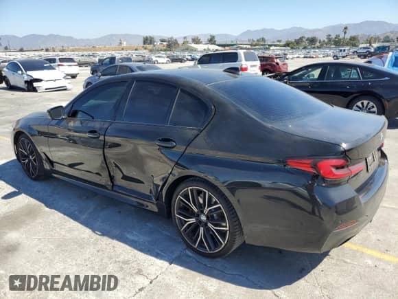 2021 BMW 5 Series 530i with VIN WBA53BH01MCF98598, listed as a Copart auction lot 69694775 with 58,456 mi miles and Salvage title. Bid and sale history available at DreamBid. Image 2.