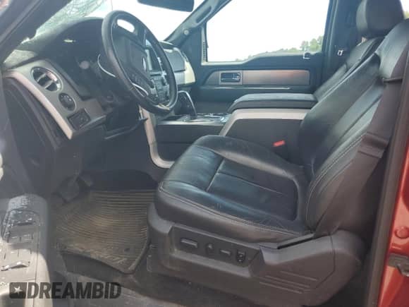 2013 Ford F-150 FX4 с VIN 1FTFW1EF4DKG02129, выставлен на аукционе Copart как лот 70013175 с пробегом Не указан миль и Списание • Salvage title. История ставок и продаж доступна на DreamBid. Изображение 7.