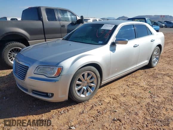 2012 Chrysler 300 Limited z VIN 2C3CCACG1CH309578, wystawiony jako IAAI lot #43423550 z przebiegiem 166 557 mil mil oraz . Historia ofert i sprzedaży dostępna na DreamBid. Obrazek 2.