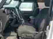 2022 Jeep Wrangler Sport S с VIN 1C4GJXAG5NW259605, выставлен на аукционе Copart как лот 57659775 с пробегом 14 864 миль миль и Списание • Salvage title. История ставок и продаж доступна на DreamBid. Изображение 7.