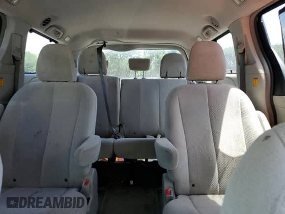 2012 Toyota Sienna LE with VIN 5TDJK3DC1CS038228, listed as a Copart auction lot 65023615 with 180,891 mi miles and Clean title. Bid and sale history available at DreamBid. Image 10.