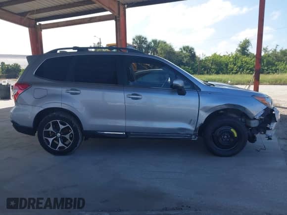 2016 Subaru Forester XT Touring with VIN JF2SJGXC1GH405232, listed as a IAAI auction lot 43370477 with 201,225 mi miles and . Bid and sale history available at DreamBid. Image 13.