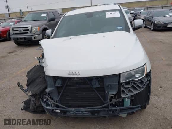 2018 Jeep Grand Cherokee Sterling with VIN 1C4RJEBG5JC221735, listed as a IAAI auction lot 42182575 with 123,505 mi miles and . Bid and sale history available at DreamBid. Image 13.