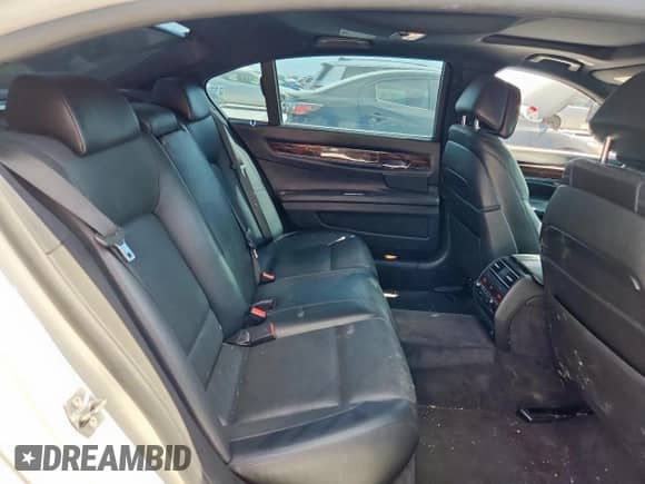 2013 BMW 7 Series 750Li xDrive с VIN WBAYF8C51DDE59480, выставлен на аукционе Copart как лот 66290455 с пробегом 89 148 миль миль и Списание • Salvage title. История ставок и продаж доступна на DreamBid. Изображение 10.