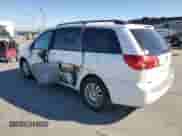 2010 Toyota Sienna XLE с VIN 5TDYK4CC3AS310667, выставлен на аукционе Copart как лот 86077205 с пробегом 184 017 миль миль и Списание • Salvage title. История ставок и продаж доступна на DreamBid. Изображение 2.