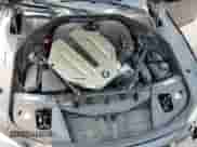 2010 BMW 7 Series 750i xDrive z VIN WBAKC6C51ACL67738, wystawiony jako Copart lot #57118295 z przebiegiem 124 911 mil mil oraz Szkoda całkowita • Salvage title. Historia ofert i sprzedaży dostępna na DreamBid. Obrazek 11.