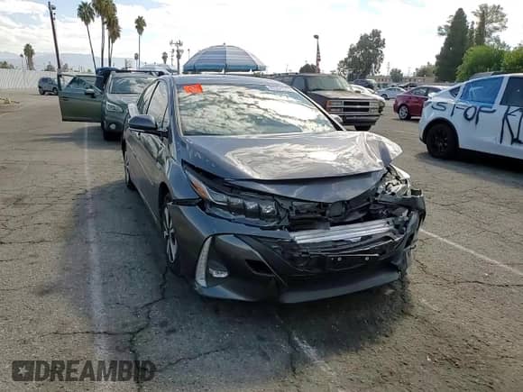 2018 Toyota Prius Plus z VIN JTDKARFP7J3086633, wystawiony jako Copart lot #82094685 z przebiegiem 275 692 mil mil oraz Szkoda całkowita • Salvage title. Historia ofert i sprzedaży dostępna na DreamBid. Obrazek 13.