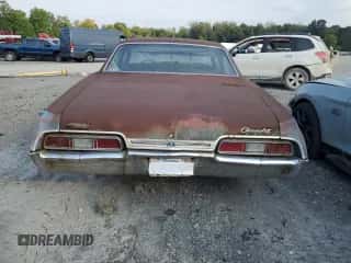 1967 Chevrolet Impala с VIN 164697Y202459, выставлен на аукционе Copart как лот 84990274 с пробегом 92 933 миль миль и Списание • Salvage title. История ставок и продаж доступна на DreamBid. Изображение 6.