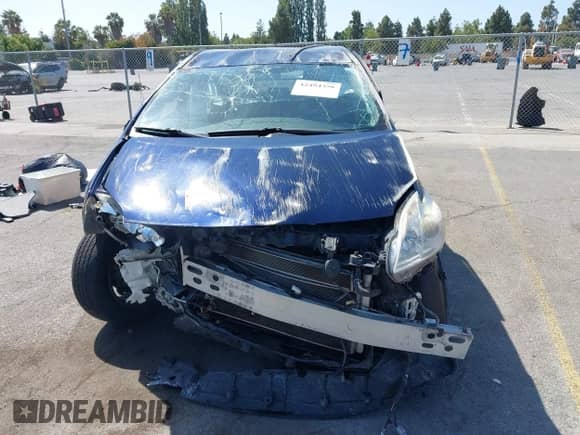 2015 Toyota Prius Four z VIN JTDKN3DU8F1997678, wystawiony jako IAAI lot #42494356 z przebiegiem 120 416 mil mil oraz . Historia ofert i sprzedaży dostępna na DreamBid. Obrazek 13.