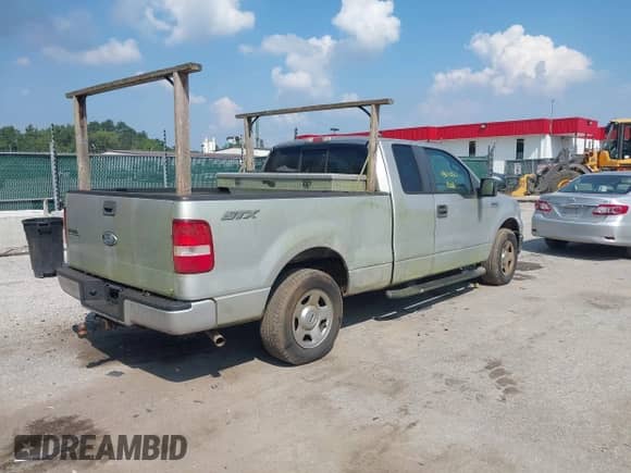 2007 Ford F-150 STX with VIN 1FTRX12WX7FA06762, listed as a IAAI auction lot 43010327 with 156,760 mi miles and . Bid and sale history available at DreamBid. Image 4.
