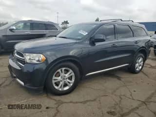 2013 Dodge Durango SXT with VIN 1C4RDJAG8DC665391, listed as a Copart auction lot 82091615 with 217,229 mi miles and Clean title. Bid and sale history available at DreamBid. Image 1.
