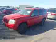 2000 Jeep Grand Cherokee Limited z VIN 1J4GW58N5YC186410, wystawiony jako IAAI lot #42504152 z przebiegiem 140 982 mil mil oraz . Historia ofert i sprzedaży dostępna na DreamBid. Obrazek 2.