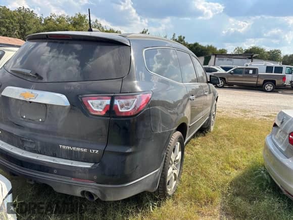 2016 Chevrolet Traverse LTZ с VIN 1GNKRJKDXGJ270191, выставлен на аукционе IAAI как лот 43386619 с пробегом 157 342 миль миль и . История ставок и продаж доступна на DreamBid. Изображение 4.
