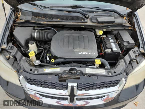 2012 Dodge Grand Caravan SXT с VIN 2C4RDGCG7CR160917, выставлен на аукционе Copart как лот 86073045 с пробегом 159 826 миль миль и Списание • Salvage title. История ставок и продаж доступна на DreamBid. Изображение 12.