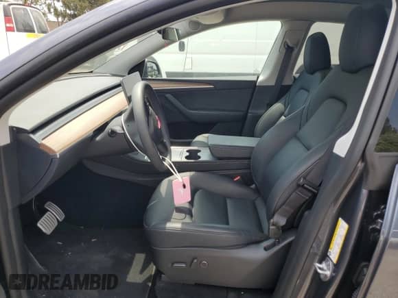 2023 Tesla Model Y Performance with VIN 7SAYGDEF3PF941606, listed as a Copart auction lot 62955764 with 5,176 mi miles and Salvage title. Bid and sale history available at DreamBid. Image 7.