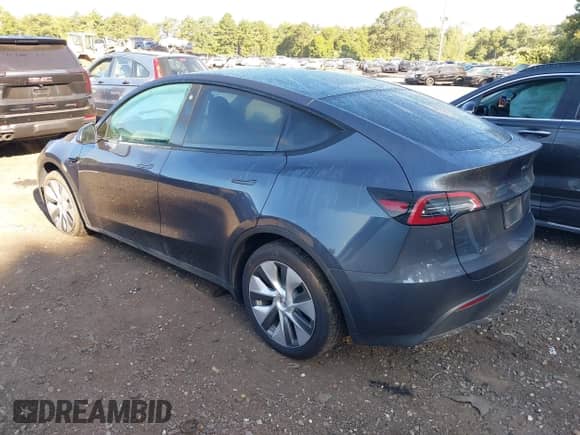 2023 Tesla Model Y Long Range with VIN 7SAYGDEE6PA098084, listed as a IAAI auction lot 43095726 with 30,506 mi miles and . Bid and sale history available at DreamBid. Image 3.