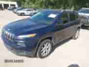 2014 Jeep Cherokee Latitude with VIN 1C4PJMCS0EW197448, listed as a IAAI auction lot 43325751 with 223,473 mi miles and . Bid and sale history available at DreamBid. Image 2.