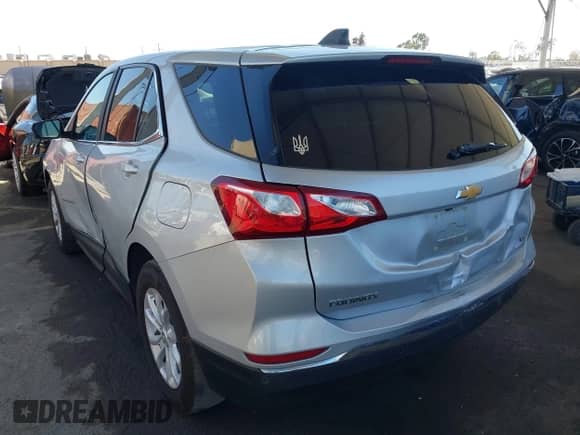 2021 Chevrolet Equinox LT with VIN 3GNAXJEV6MS161985, listed as a IAAI auction lot 43131002 with 169,303 mi miles and . Bid and sale history available at DreamBid. Image 3.