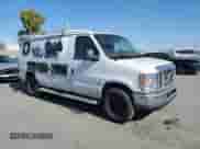 2014 Ford Econoline Cargo Commercial with VIN 1FTNE2EW0EDA19213, listed as a Copart auction lot 71137305 with 184,738 mi miles and Clean title. Bid and sale history available at DreamBid. Image 4.