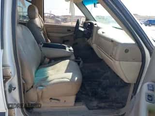 2001 Chevrolet Tahoe Special Service z VIN 1GNEC13V81J292896, wystawiony jako IAAI lot #42061466 z przebiegiem 207 762 mil mil oraz . Historia ofert i sprzedaży dostępna na DreamBid. Obrazek 5.