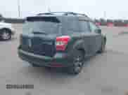 2015 Subaru Forester XT Premium with VIN JF2SJGDC3FH468366, listed as a IAAI auction lot 43140719 with 139,563 mi miles and . Bid and sale history available at DreamBid. Image 4.