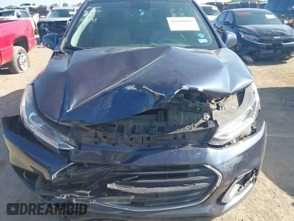 2019 Chevrolet Trax LT z VIN 3GNCJLSB4KL190764, wystawiony jako IAAI lot #42690882 z przebiegiem 127 680 mil mil oraz . Historia ofert i sprzedaży dostępna na DreamBid. Obrazek 6.