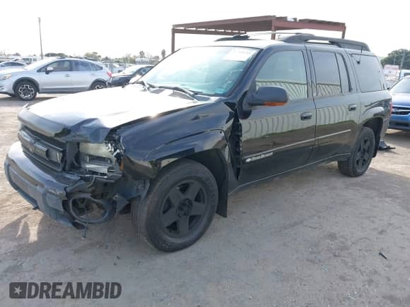 2002 Chevrolet TrailBlazer EXT LT z VIN 1GNET16S026115393, wystawiony jako IAAI lot #41745233 z przebiegiem 269 975 mil mil oraz . Historia ofert i sprzedaży dostępna na DreamBid. Obrazek 18.