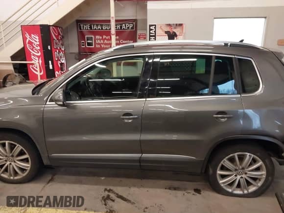 2012 Volkswagen Tiguan SE с VIN WVGBV7AX7CW103623, выставлен на аукционе IAAI как лот 41250142 с пробегом 82 505 миль миль и . История ставок и продаж доступна на DreamBid. Изображение 13.