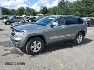 2012 Jeep Grand Cherokee Limited z VIN 1C4RJEBG7CC276299, wystawiony jako Copart lot #64085755 z przebiegiem 86 272 mil mil oraz Szkoda całkowita • Salvage title. Historia ofert i sprzedaży dostępna na DreamBid. Obrazek 1.