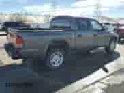 2002 Dodge Dakota Sport z VIN 1B7HL38N72S715327, wystawiony jako Copart lot #46477865 z przebiegiem 225 619 mil mil oraz Szkoda całkowita • Salvage title. Historia ofert i sprzedaży dostępna na DreamBid. Obrazek 3.