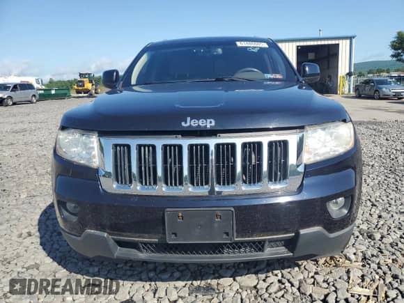 2011 Jeep Grand Cherokee 70th Anniversary z VIN 1J4RR4GG2BC702713, wystawiony jako Copart lot #61486085 z przebiegiem 184 892 mil mil oraz Szkoda całkowita • Salvage title. Historia ofert i sprzedaży dostępna na DreamBid. Obrazek 5.