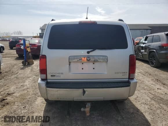 2011 Dodge Nitro SXT z VIN 1D4PU5GK9BW575899, wystawiony jako Copart lot #50897745 z przebiegiem 179 142 mil mil oraz Czysty tytuł • Clean title. Historia ofert i sprzedaży dostępna na DreamBid. Obrazek 6.