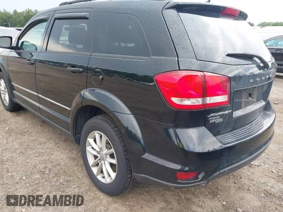 2017 Dodge Journey SXT with VIN 3C4PDDBG0HT515163, listed as a IAAI auction lot 42711370 with 102,440 mi miles and . Bid and sale history available at DreamBid. Image 3.