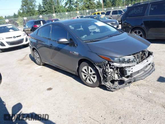 2018 Toyota Prius Plus z VIN JTDKARFP1J3071500, wystawiony jako IAAI lot #42665651 z przebiegiem 168 014 mil mil oraz . Historia ofert i sprzedaży dostępna na DreamBid. Obrazek 1.